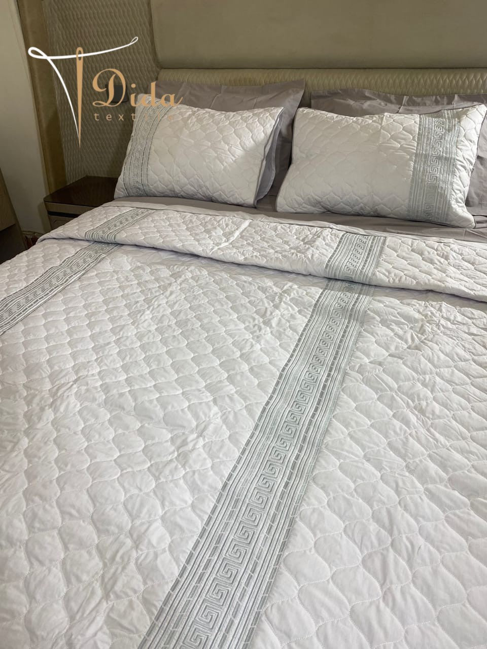 Embroidered Capitonné Coverlet